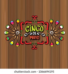 Cinco de Mayo banner with hand drawn calligraphy lettering. Mexican fiests holiday vector background. Cinco de Mayo calligraphic greeting card or poster on wooden background