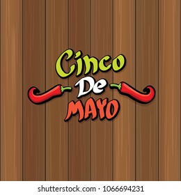 Cinco de Mayo banner with hand drawn calligraphy lettering. Mexican fiests holiday vector background. Cinco de Mayo calligraphic greeting card or poster on wooden background