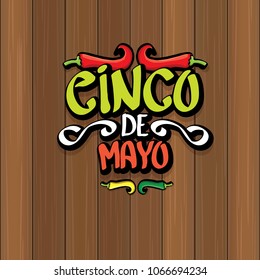 Cinco de Mayo banner with hand drawn calligraphy lettering. Mexican fiests holiday vector background. Cinco de Mayo calligraphic greeting card or poster on wooden background