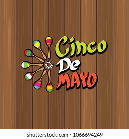 Cinco de Mayo banner with hand drawn calligraphy lettering. Mexican fiests holiday vector background. Cinco de Mayo calligraphic greeting card or poster on wooden background