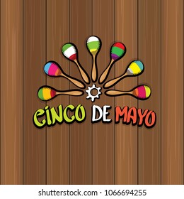 Cinco de Mayo banner with hand drawn calligraphy lettering. Mexican fiests holiday vector background. Cinco de Mayo calligraphic greeting card or poster on wooden background