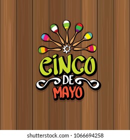 Cinco de Mayo banner with hand drawn calligraphy lettering. Mexican fiests holiday vector background. Cinco de Mayo calligraphic greeting card or poster on wooden background