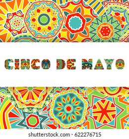 Cinco De Mayo card with bright ornate letters and background. Abstract Mexican style ornament. Bright ethnic pattern. Greeting lettering. Vector illustration.