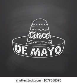 Cinco de Mayo hand drawn typography text. Vector lettering with mexican hat sombrero on chalkboard background for posters, flyers, ads, party decorations