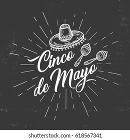 Cinco de Mayo hand sketched logotype, badge typography icon. Lettering Mexican holiday with hat, maracas for greeting card, invitation. Retro lettering banner poster template chalk board background