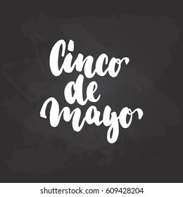 Cinco de Mayo - mexican greeting card hand drawn lettering phrase on the black chalkboard background. Fun brush ink inscription for photo overlays, t-shirt print, poster design