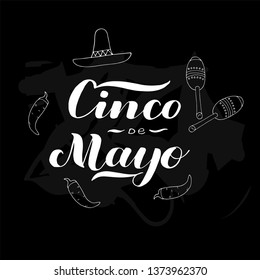 Cinco de mayo. Sombrero, red pepper, maracas. Hand drawn lettering phrase on chalkboard background.  Vector illustration for banner, poster, postcard, celebration. 