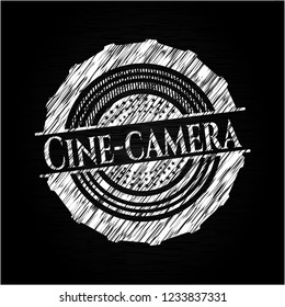 Cine-camera chalkboard emblem on black board