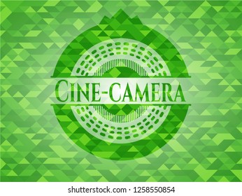 Cine-camera green emblem with mosaic background