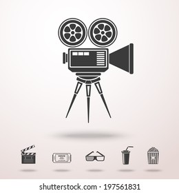 Cinema camera detailed vector monochrome icon in the air with shadow. With set of cinema icons - Film clapperboard, ticket, 3D glasses, plastic cup with straw, popcorn.