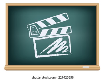 The cinema clapperboard drawn on the blackboard on the white background