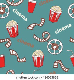 Cinema seamless pattern. Bright cinema symbols - popcorn, film reel and strip - isolated on blue. Vector background. 