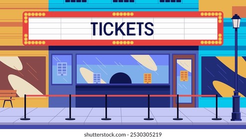 Cinema ticket booth exterior colorful storefront bright lights queue barriers bench streetlamp