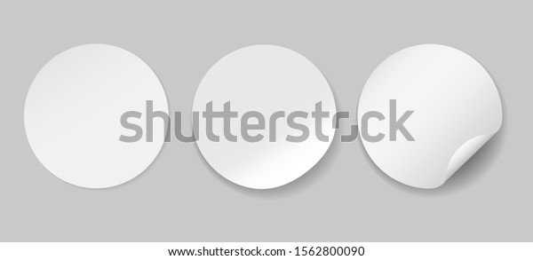Circle adhesive symbols. White tags, paper\
round stickers with peeling corner, isolated rounded plastic mockup\
signs, vector\
illustration