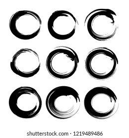 Circle black textured smears set isolated on white background