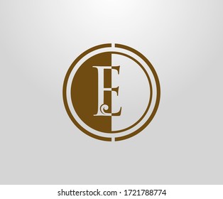 Circle E Letter Stamp logo. Graceful royal style Initial E. Vintage letter drawn emblem for book design,wedding invitation, brand name, business card, Restaurant, Boutique, Hotel. 