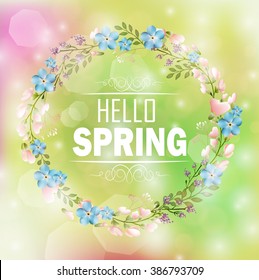 Circle floral frame with text hello spring and bokeh background.Vector