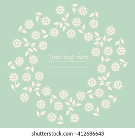 Circle frame with chamomile flowers and leaves on mint background can be used for greeting card, baby shower, invitation, cover and more designs.