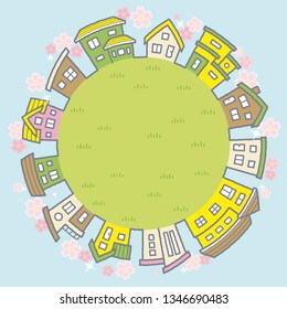 circle frame of houses with the cherry blossoms  - background is sky and grassy plain 