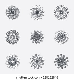 Circle geometric ornaments. Abstract spirographs set. Artistic vintage wreaths. 9 icons. Decorative Stamp patterns. Vector