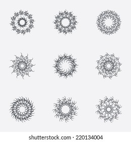 Circle geometric ornaments. Abstract spirographs set. Artistic vintage wreaths. 9 icons. Decorative Stamp patterns. Vector