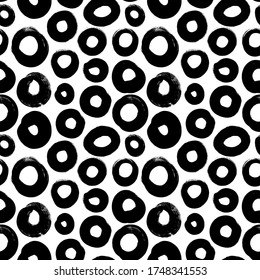 Circle grunge seamless vector pattern. Brush strokes, polka dot, rounded outline shapes. Hand drawn abstract ink background. Smears, circles, splotches, blobs. Abstract wallpaper design, textile print