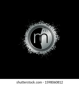 Circle Initial Letter M logo icon with grunge splash vector design concept silver color.