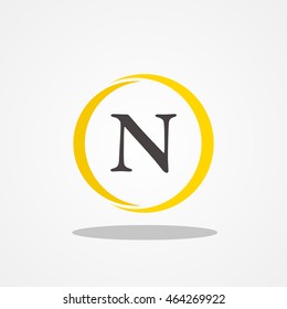 Circle initial letter N uppercase logo design template black gold