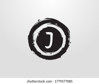 Circle J Letter Logo With Circle Grunge Splatter Element. Retro logo design template.