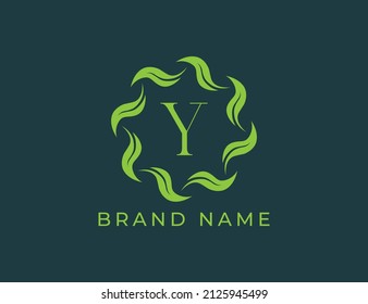 Circle of Leaves Logo icon symbol with Letter Y. Vector logo template
