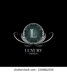 Circle Luxury Logo Letter L. Elegant logo design concept letter L on silver circle  frame with floral element for boutique, hotel, fashion and more brands.
