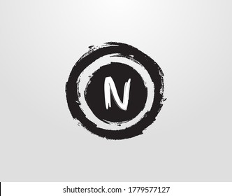 Circle N Letter Logo With Circle Grunge Splatter Element. Retro logo design template.