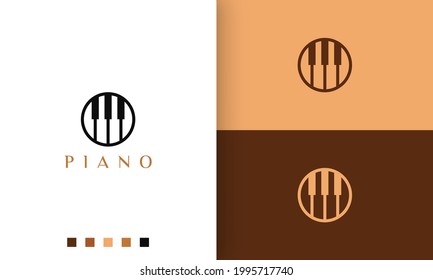 circle piano logo in simple and modern style suitable for pianist or music studio