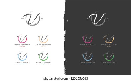 Circle splatter V letter handwritten monogram logo