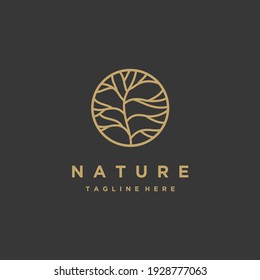 Circle tree gold minimalist logo design isolated on a black background inspiration