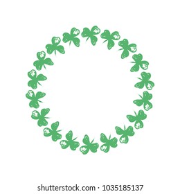 Circle wreath of Clover leaves. Symbol of Ireland and St. Patrick's Day. Green floral round frame. Hand drawn vector illustration