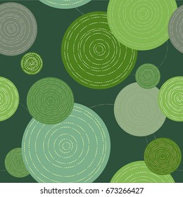 Circles with a delay in dark green scale. Seamless pattern for industrial production of fabrics and upholstery