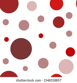 Circles of different diameters and shades of red. Vector seamless pattern.