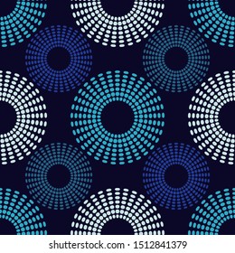 Circles of dots. Polka dots seamless pattern. Mosaic of ethnic figures. Patterned texture. Geometric background. Can be used for wallpaper, textile, invitation card, wrapping, web page background.