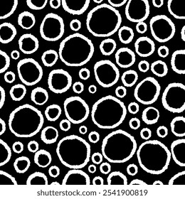 Circles seamless patten. Hand drawn white rings on black background. Abstract circle background. 