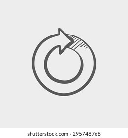 Icono de esbozo de flecha circular para web y móvil. Icono de gris oscuro vector dibujado a mano sobre fondo gris claro.