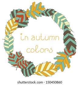 The circular frame of autumn leaves. Postcard in autumn colors