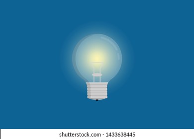 Circular light bulb shined on the blue background 