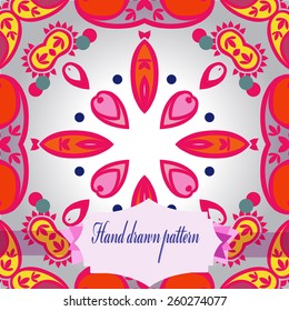 Circular oriental seamless pattern of colored floral motif, label. Hand drawn.