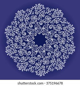 A circular ornament of flowers and leaves