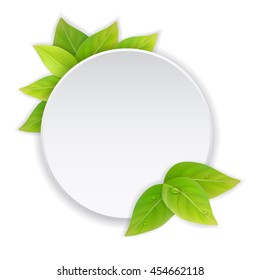 Circular paper label with green leaves. Eco sign.