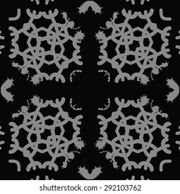 Circular pattern of abstract motif, spots, snowflakes, hole, stars, copy space. Hand drawn. Winter theme.