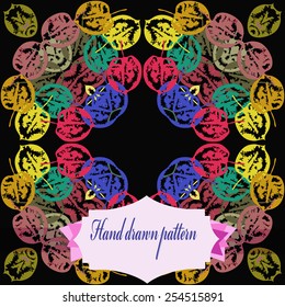 Circular pattern of colored floral motifs, autumn leaves, label  on a  black   background. Hand drawn.