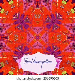 Circular pattern of colored floral motifs, label on a dark pink   background. Hand drawn.