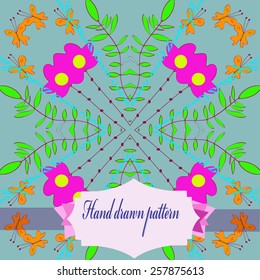 Circular  pattern of floral motif, butterflies,branches, label on a  pale azure   background. Hand drawn.